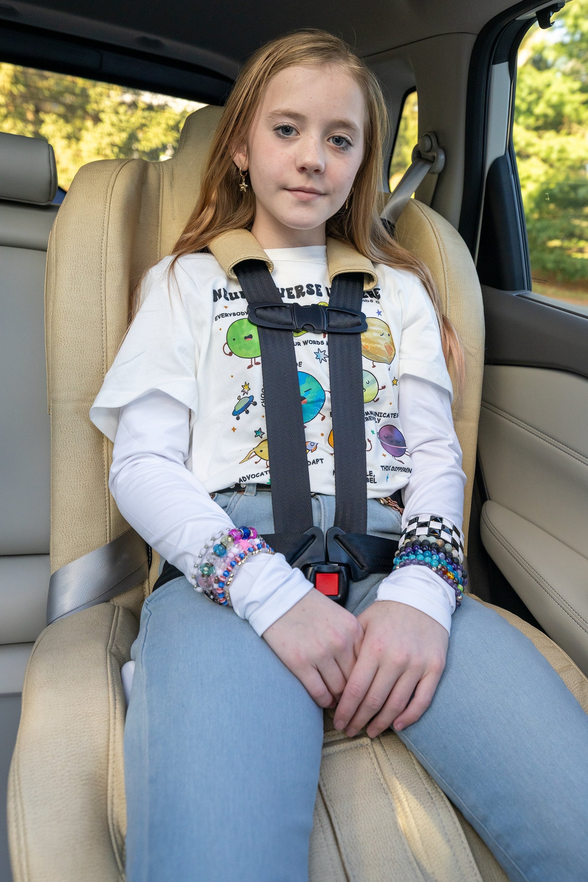 Child shown with Standard Configuration (Tan Seat)